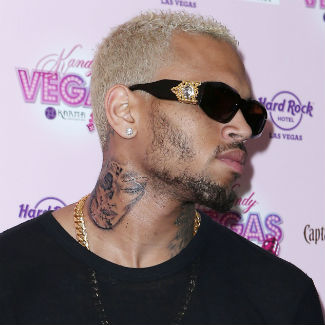 Chris Brown Reveals 'Beaten Woman' Tattoo - Is It An Image Of Rihanna? | Gigwise 325_x_325_jpg
