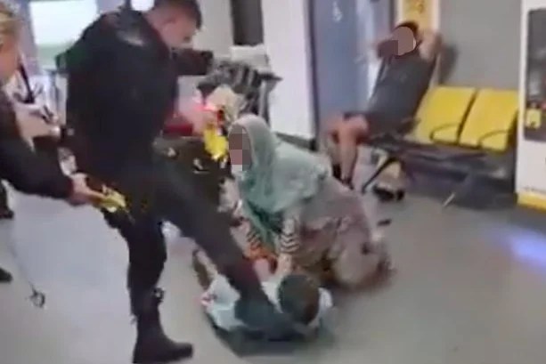 Manchester airport police officer suspended after video shows man being kicked in face