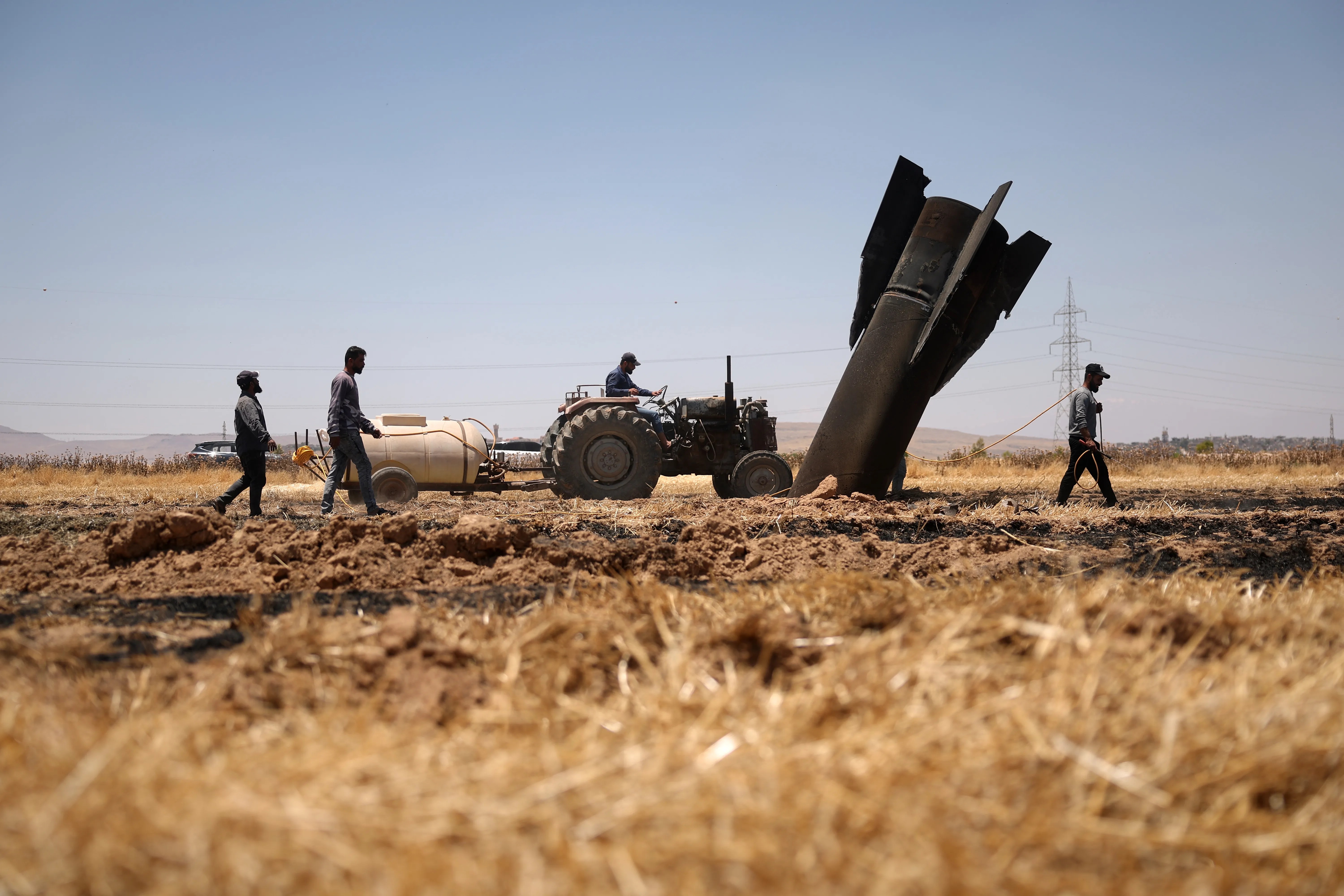 Israel and Iran Appear to Pause Strikes After Trading Fire for the First Time Since April Ceasefire