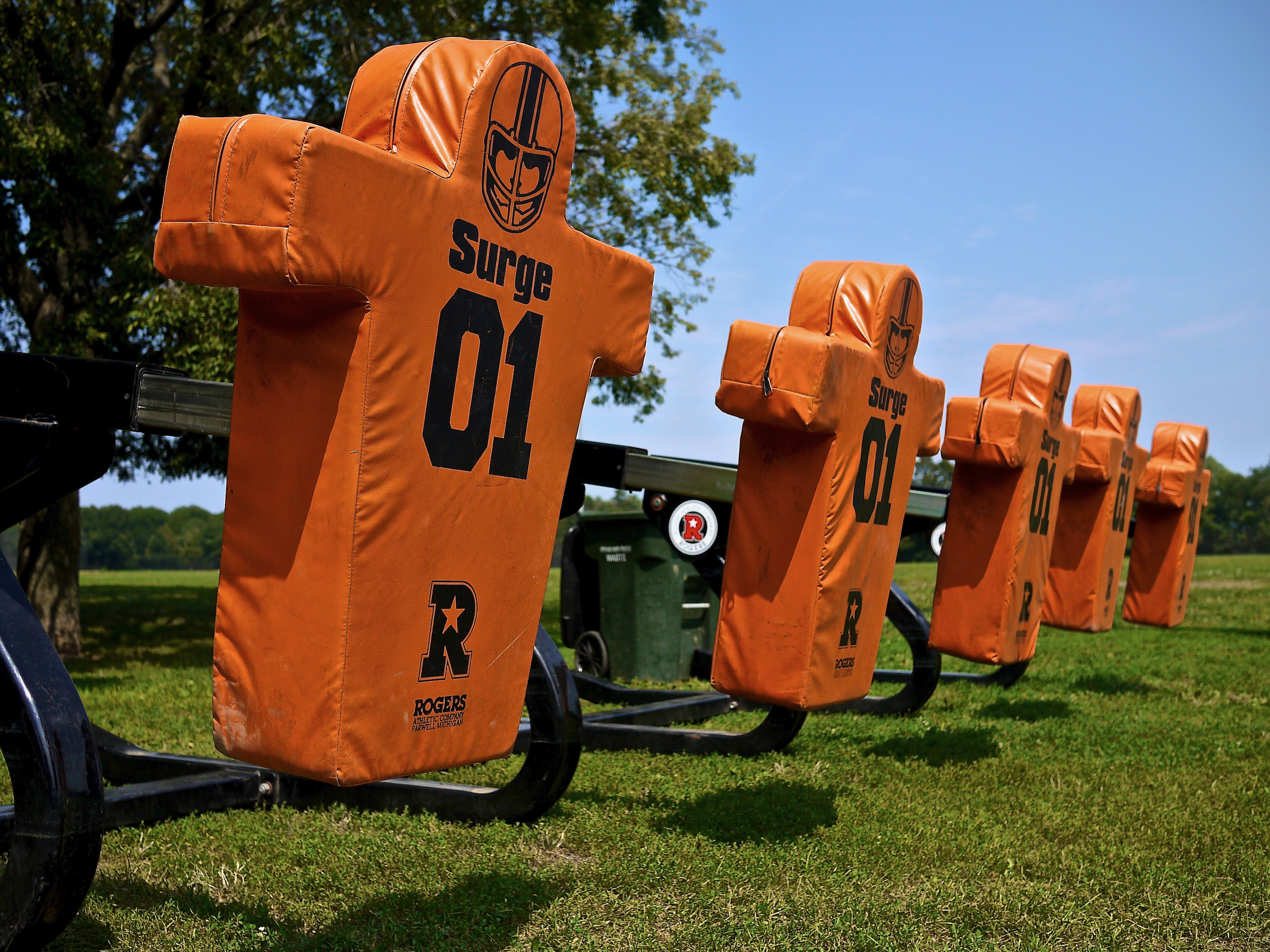 A row of football training dummies.
