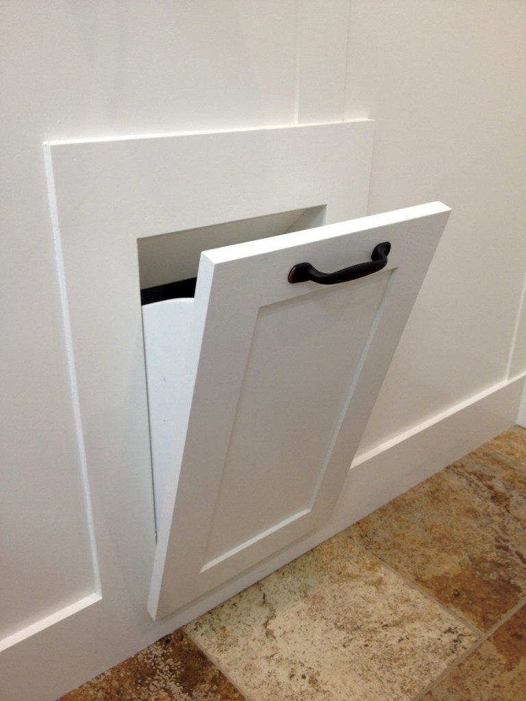 Perch a laundry basket on a table or the floor at the bottom of the chute. 9 Laundry Room Projects that Will Change Your Life