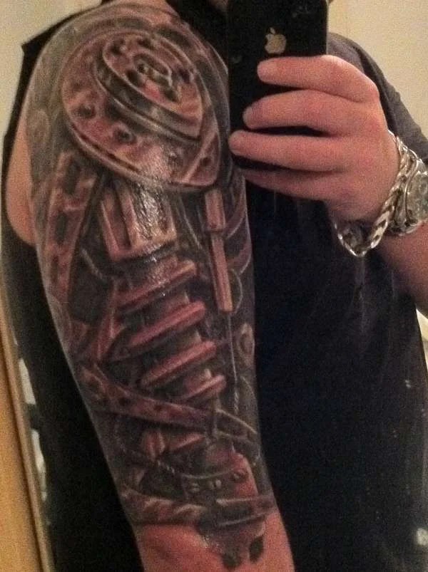 60+ Glorious Mechanical Arm Tattoos Easy Design And Ideas 803_x_600_jpg