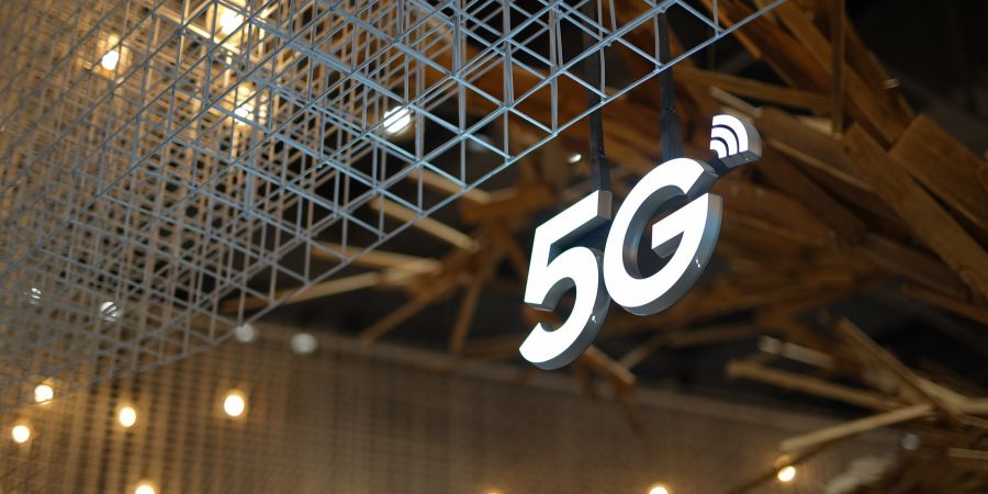 Why do some 5G phones need a software update to enable 5G support?