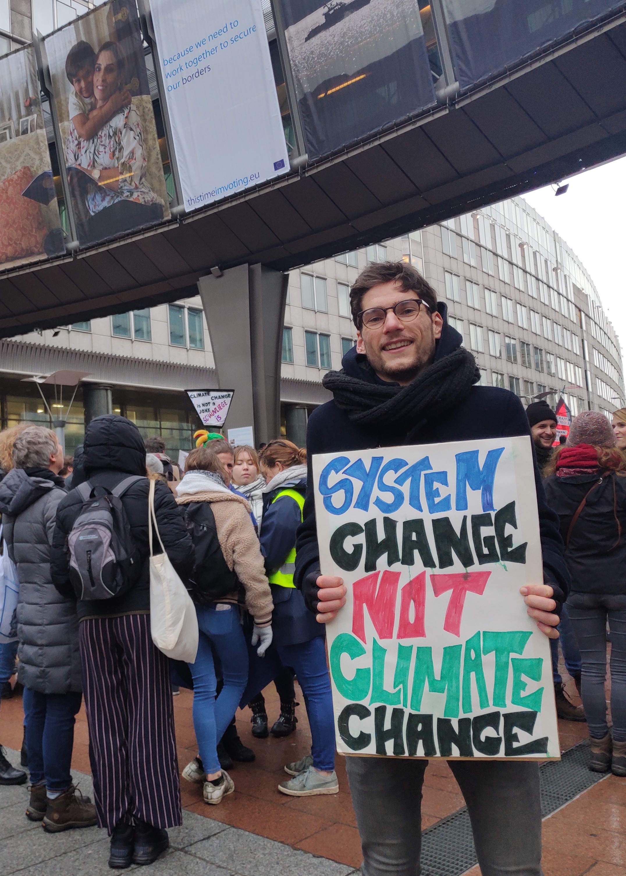 System Change not Climate Change - my protest sign explained | The Shift