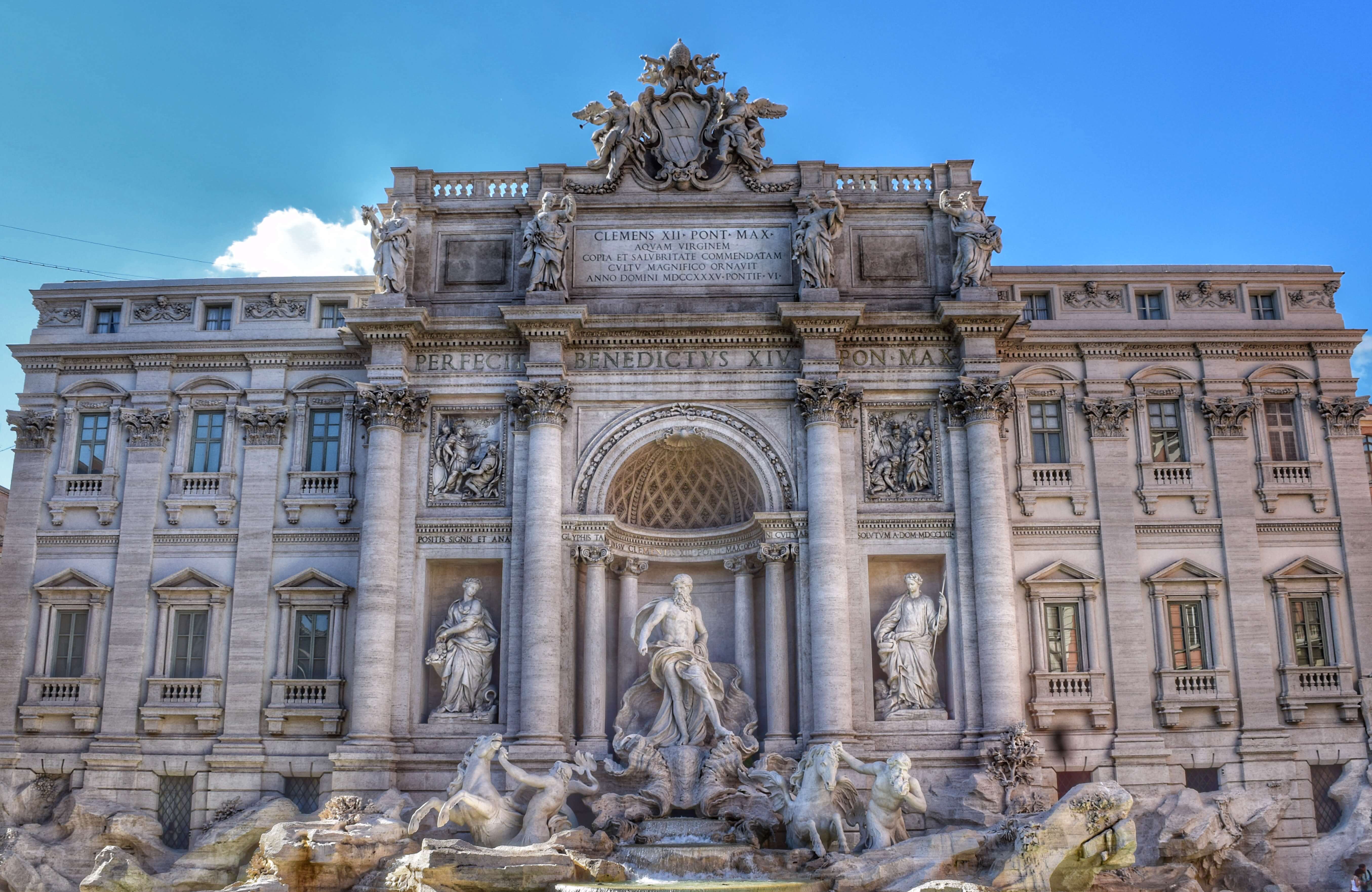 Trevi Fountain in Rome. Add tossing a coin into the fountain to your Rome bucket list. ©Jenna Lee