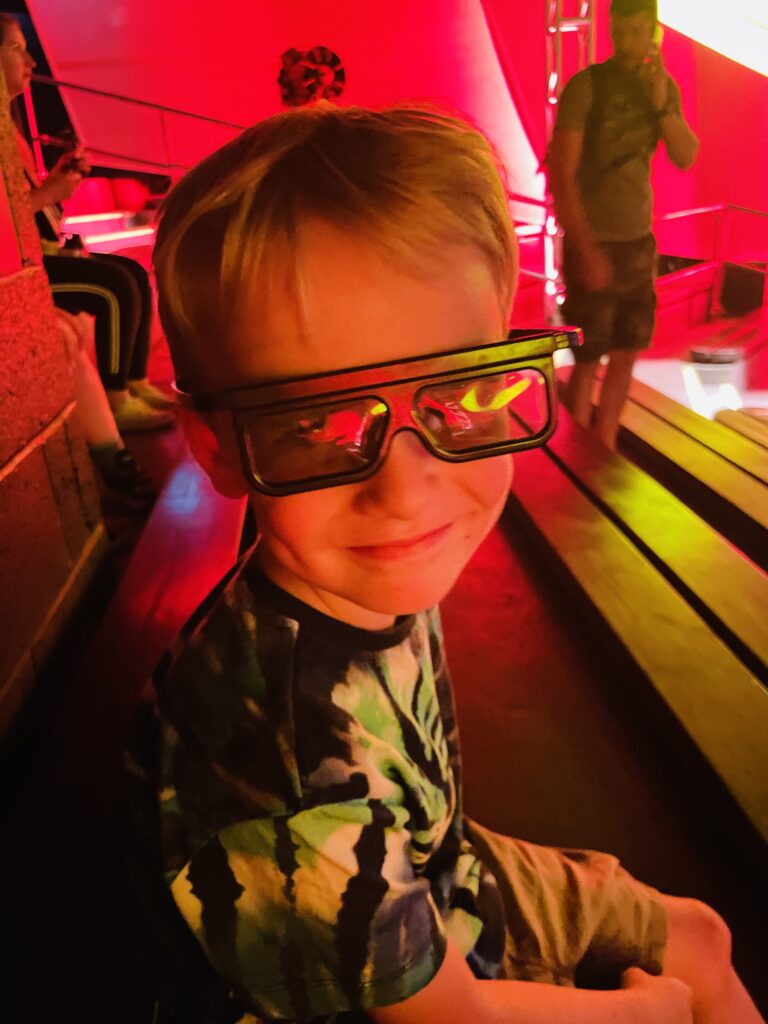 A little boy at the 4D cinema in Legoland