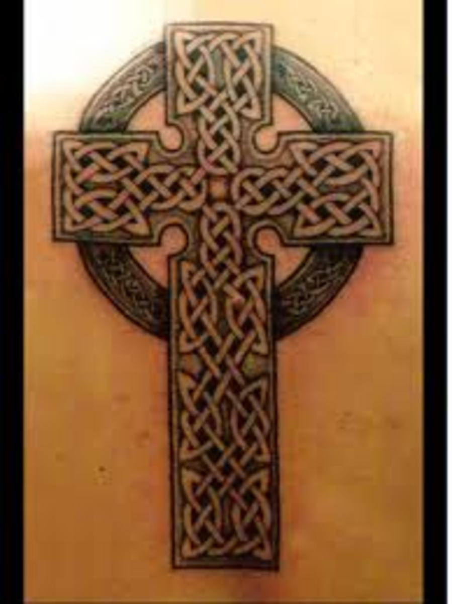 This is a reasonably good amalgamation of the irish and the german neighborhood. Cross Tattoos, Angel Tattoos, And Religious Tattoos; Cross Choices And Symbolic Meanings | HubPages