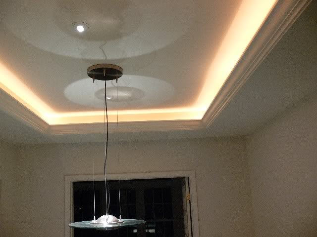 Recessed lighting can add a soft glow to the room. Tray ceiling lights - reflect the surface for the perfect