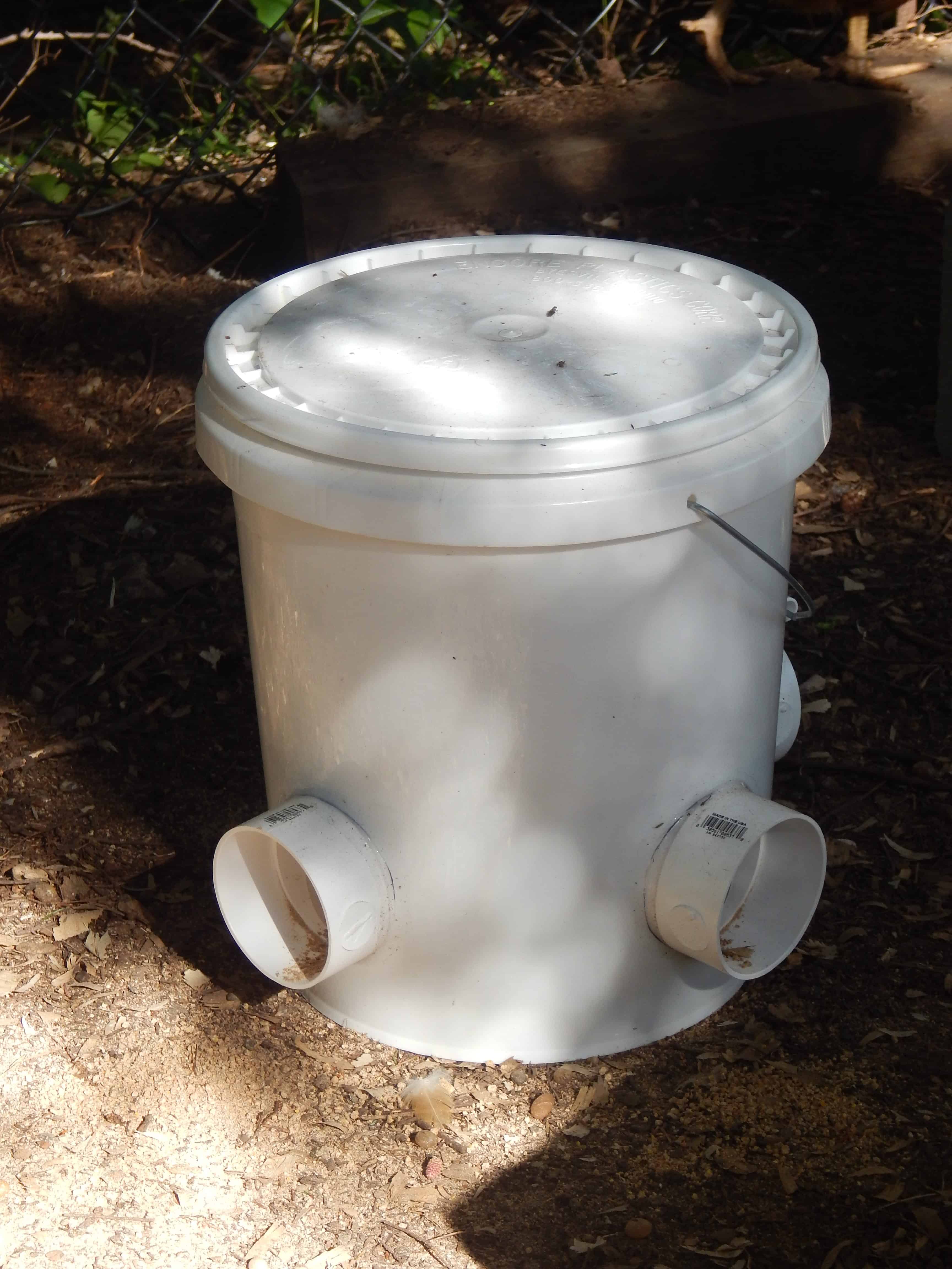 DIY Bucket Chicken Feeder (from a 5 gallon bucket!) | Far From Normal