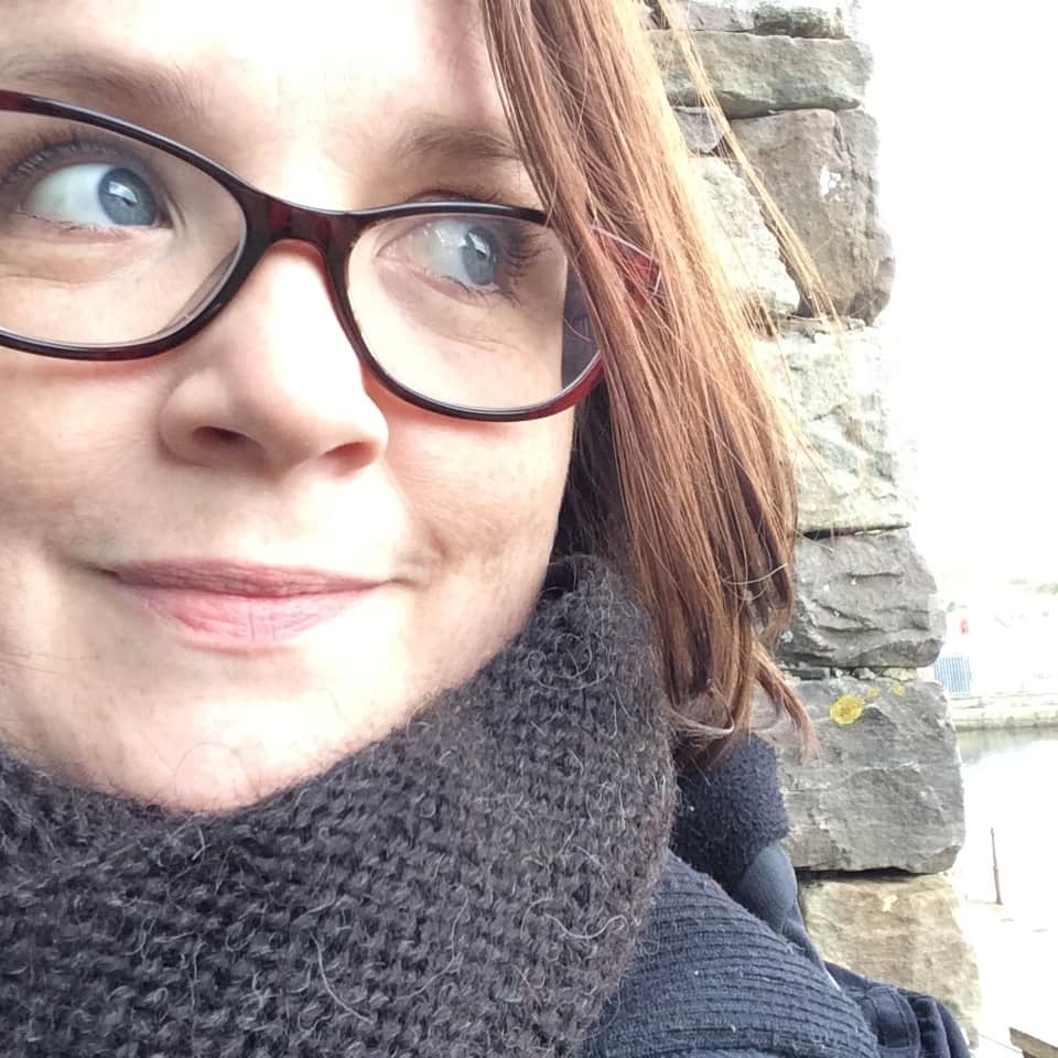 Me in my hap cowl - waiting for the museum to open