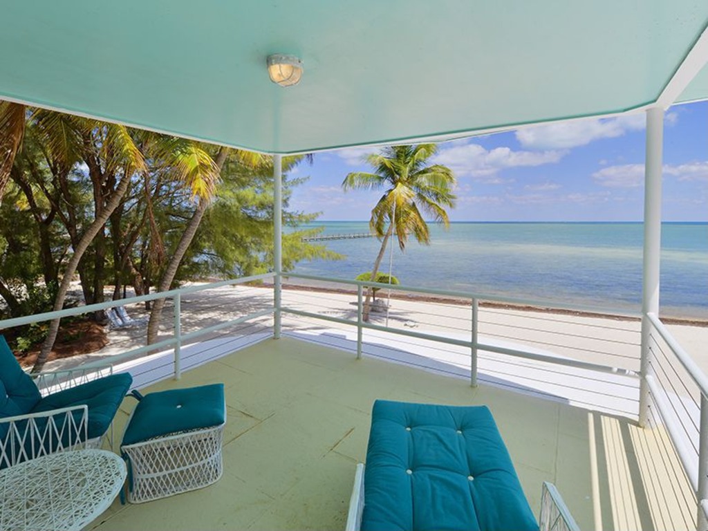 You can remove the sails to lower the masts by yourself in 1 hour. House of the Week: Beached Florida Keys Houseboat