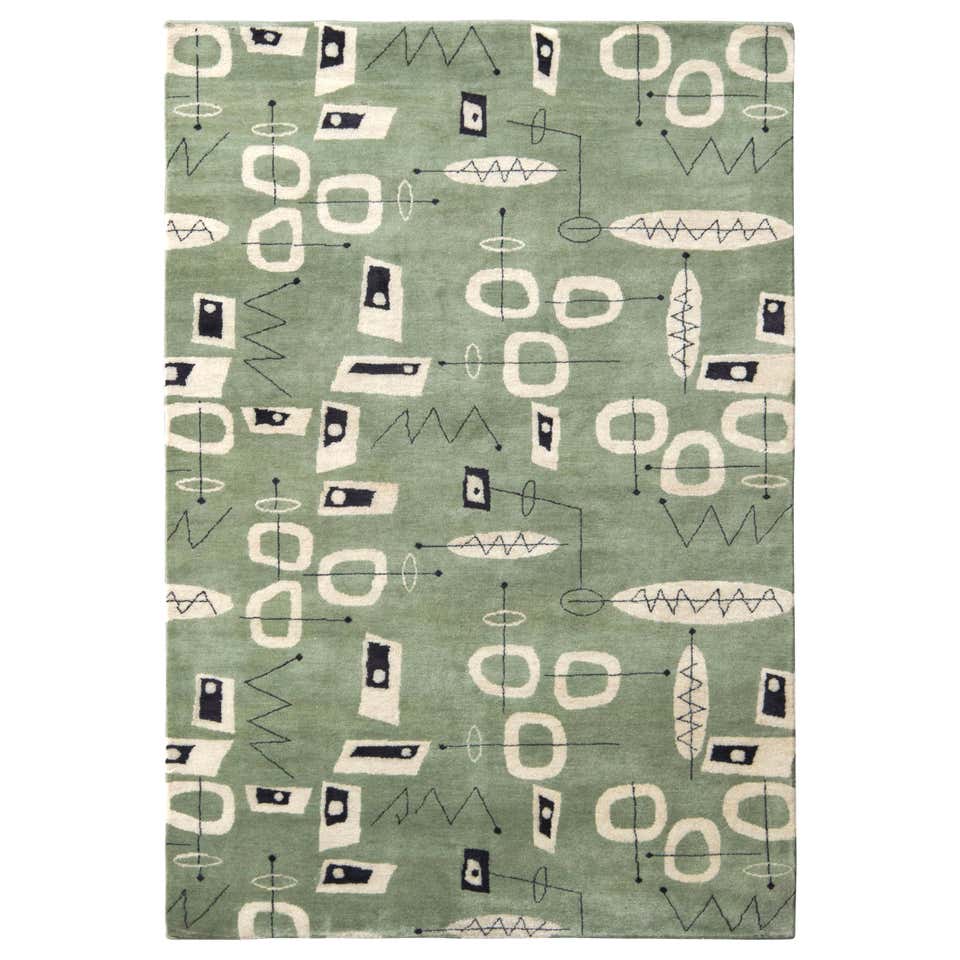 Design is a lot of things, not all of them at the same time. 8 Area Rugs To Bring Color To Your Midcentury Space