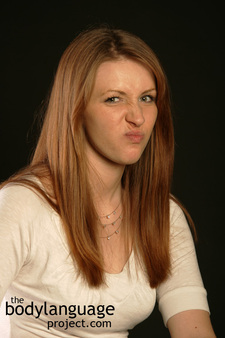 As it turns out, anything that causes the skin cells of your lips to lose moisture can. Pursed Lips Body Language Meaning