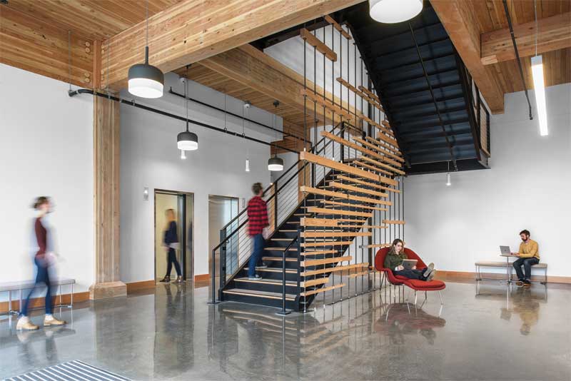 Definition of glass ceiling ( noun) an artificial, unseen, and often unacknowledged discriminatory barrier that prevents otherwise qualified people such as women and minorities from rising to positions of leadership and power, particularly within a corporation. Heavy timber construction is becoming popular