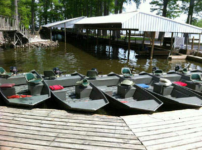 Lodging for any size group available at waterfront . Cypress Point Resort Fishing Boats