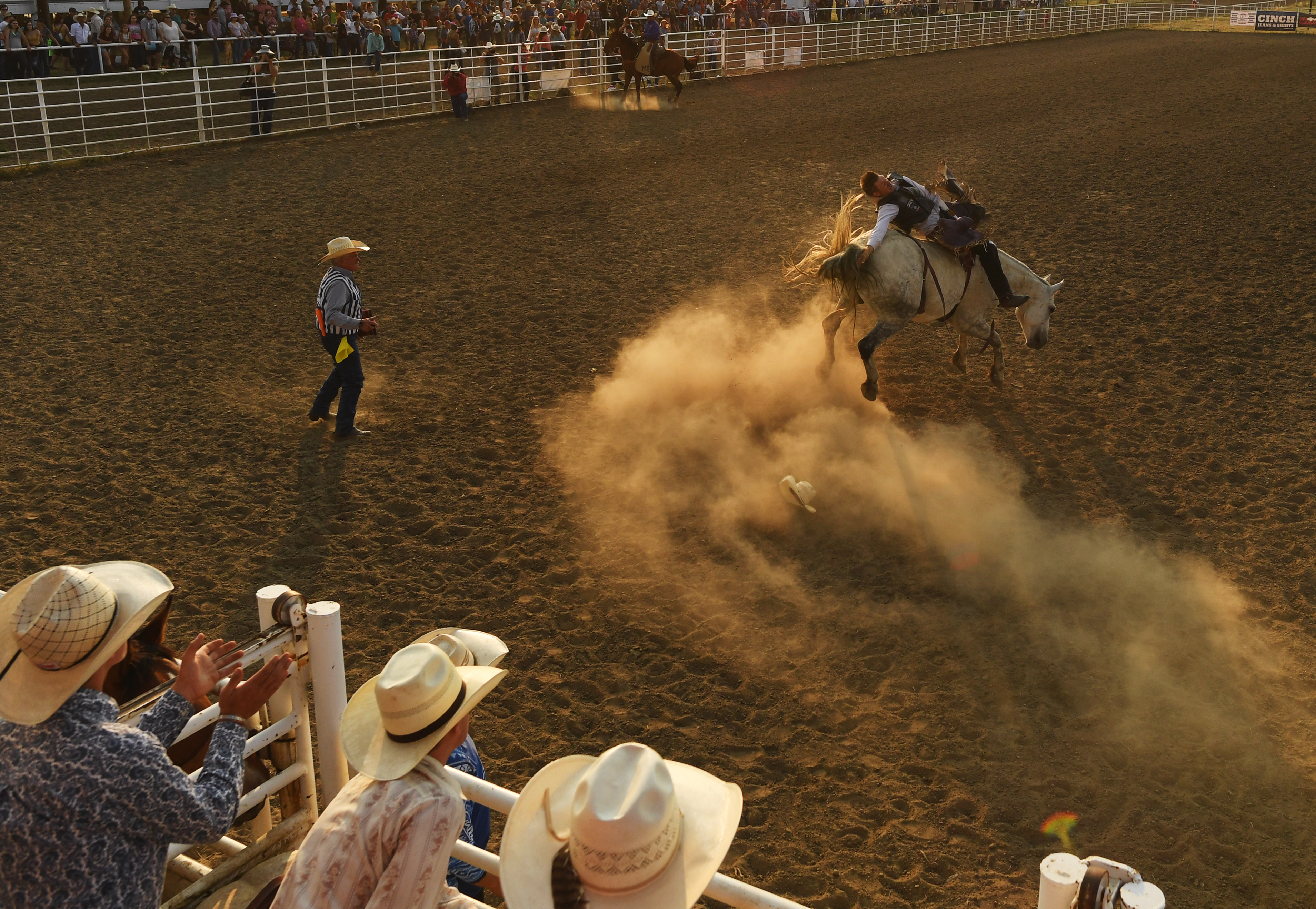 Bareback rider Tyler Ferguson is cheered ...
