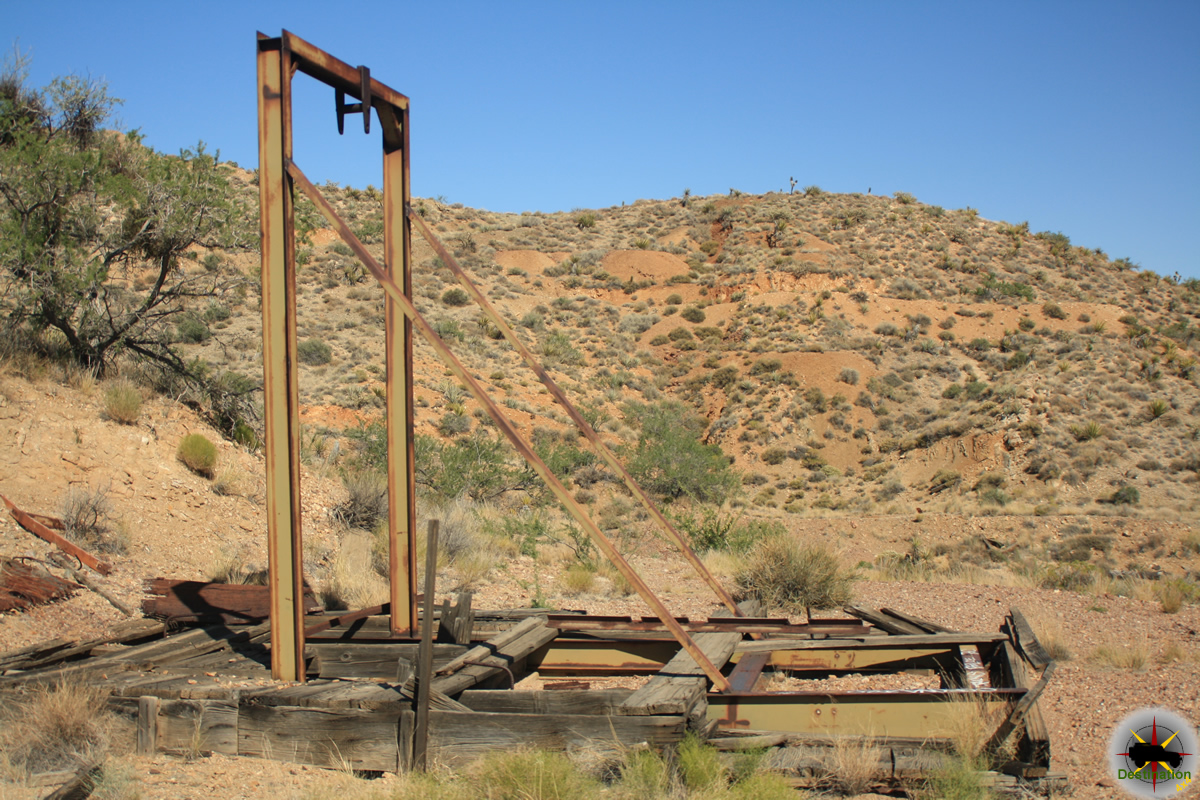 A metal headframe marks a vertical shaft in the mining district outside of Vanderbilt California.