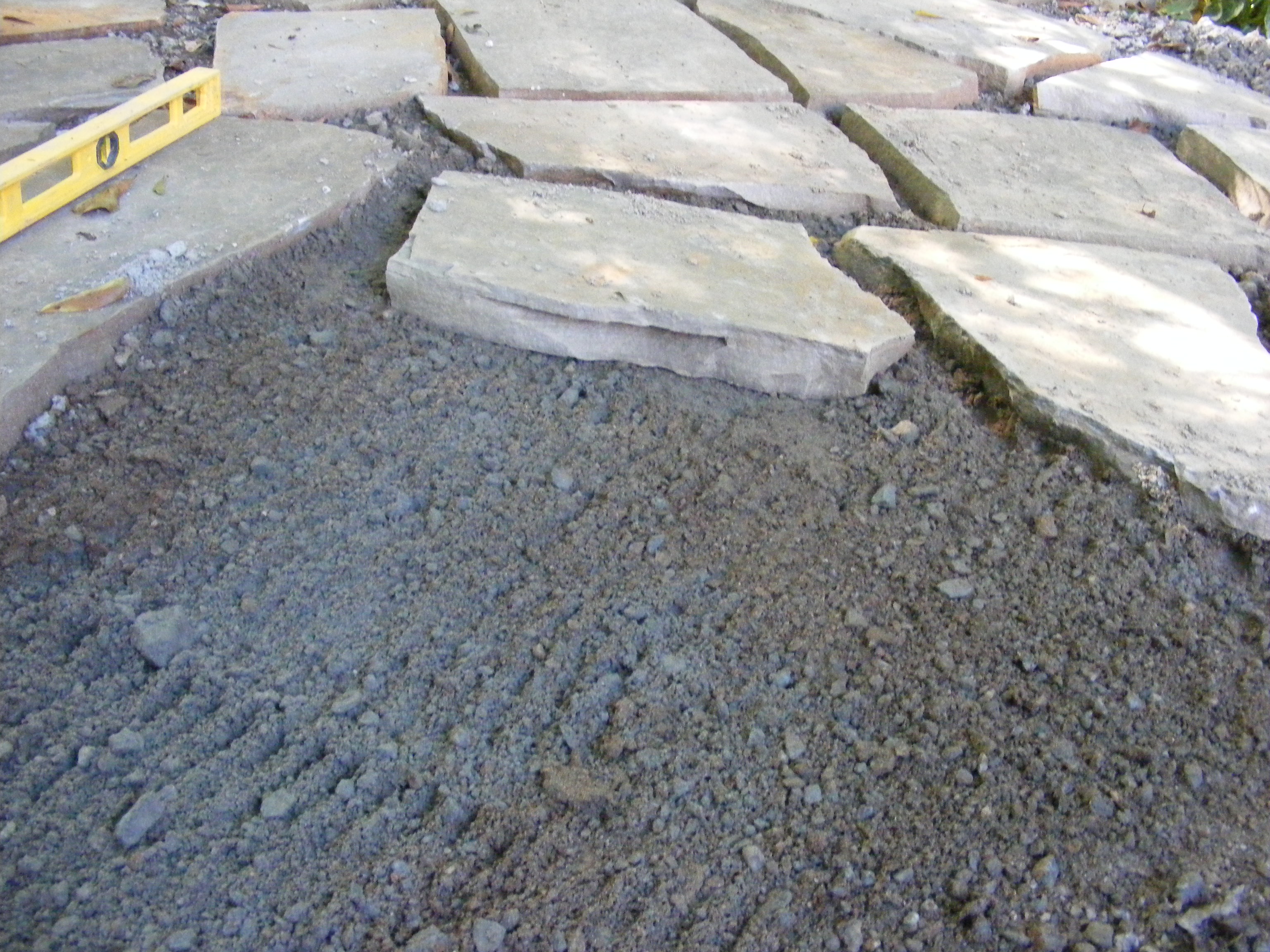 Learn how to build a lasting patio without mortar or a concrete slab. Make A Flagstone Patio