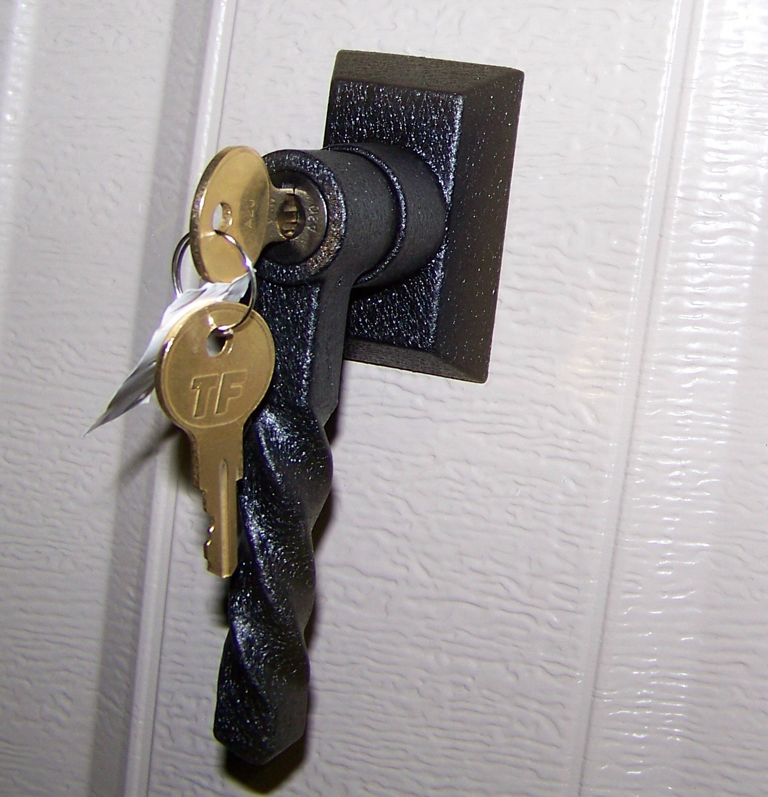 Exterior sliding door hardware perfect for coastal regions; Garage Door Lock