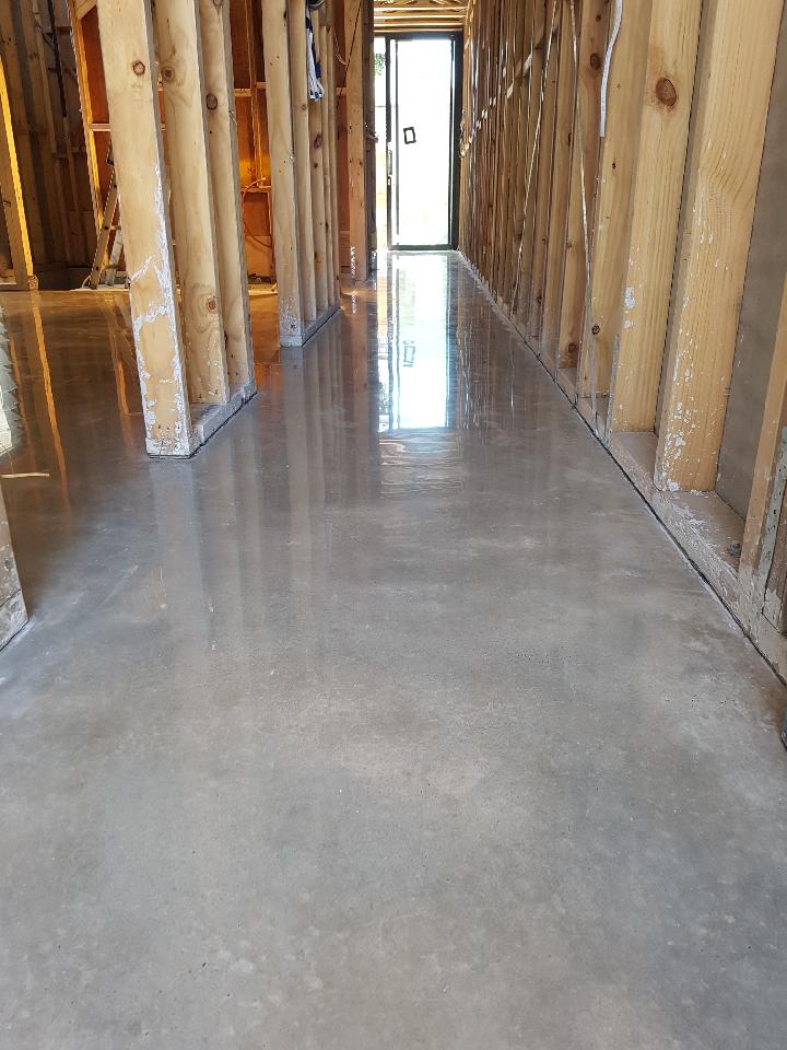 Use a concrete grinder to grind down any particularly high spots. GrindWorks Polished Concrete | Services - Grind and Seal