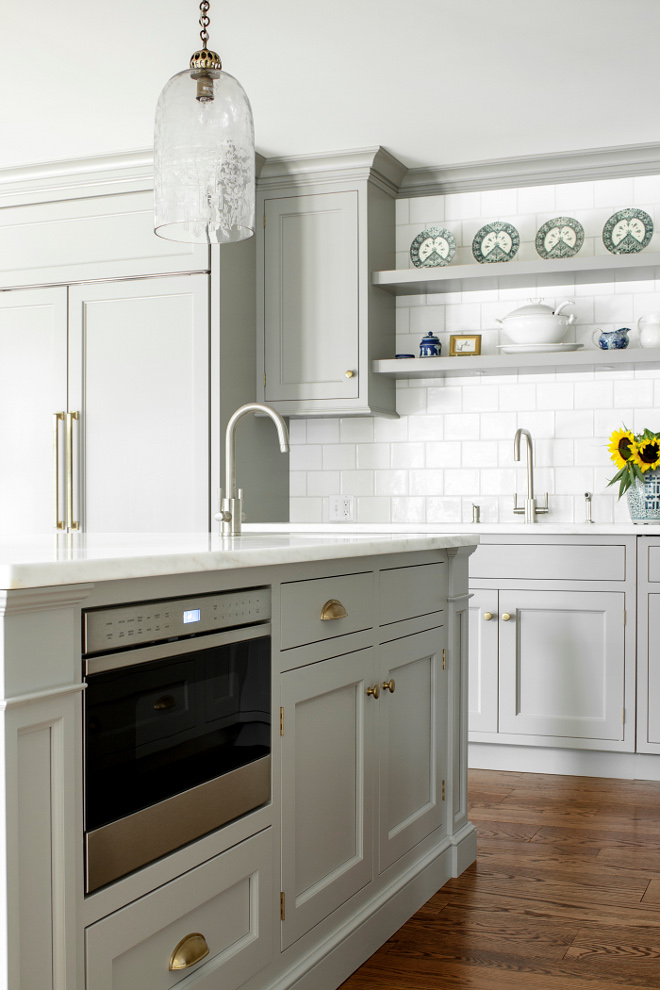 Use cabinets as your island's base and you'll add storage,. Custom Kitchen with Gray Cabinets - Home Bunch Interior