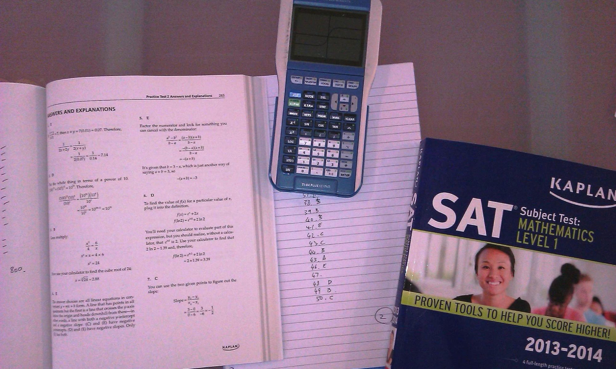croppedcalculatorandopenbook.jpg Online maths and physics tutor