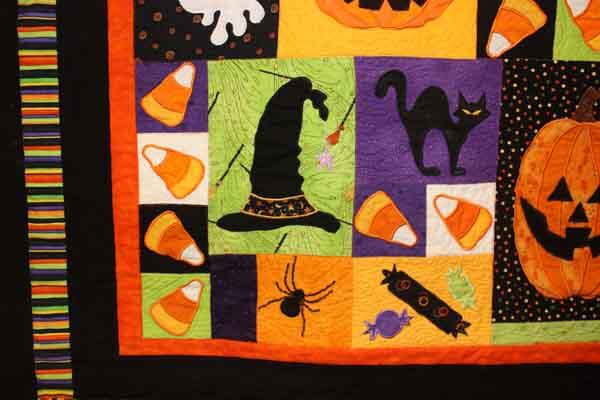 The pumpkins on this wall hanging almost seem to be glowing. Halloween Fun Quilt Machine Embroidered Wall Hanging Needlepointers Com