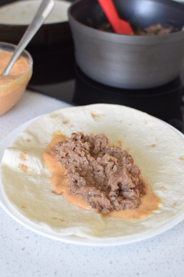 This is an easy beef and bean dinner recipe for the slow cooker, or use it as a side dish for barbecue. Easy Beef Bean And Cheese Burritos Nobiggie Net