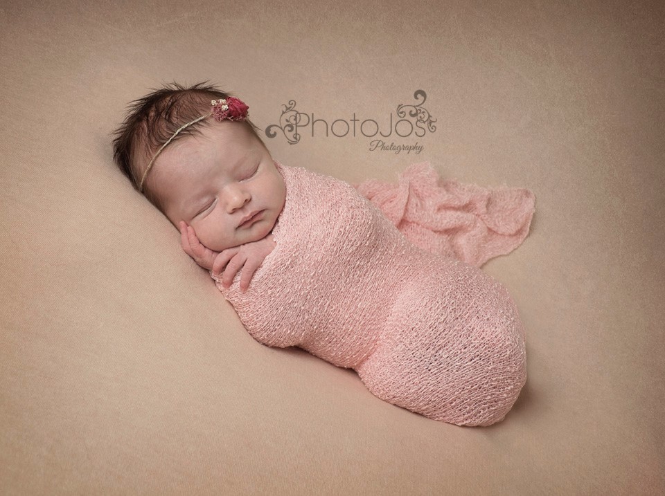 The art of baby wrapping in newborn photography Photojos Photography