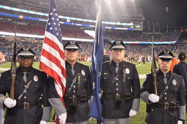 The Sanford Police Honor Guard represented Maine on Sunday at Gillette Stadium in Foxborough, Massachusetts, as the New England Patriots took on the Atlanta Falcons, winning 23-7. Members, left to right, are Officer Eddie Murphy, Detective Chad Allen, Detective Eric Small and Corporal Matthew Gagne. COURTESY PHOTO/Sanford Police