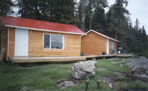 This cottage has 2 double beds and a bunk room (2 bunks, 1 single, and 1 futon). Rustys Lodge accommodations Cabins Showers Washrooms