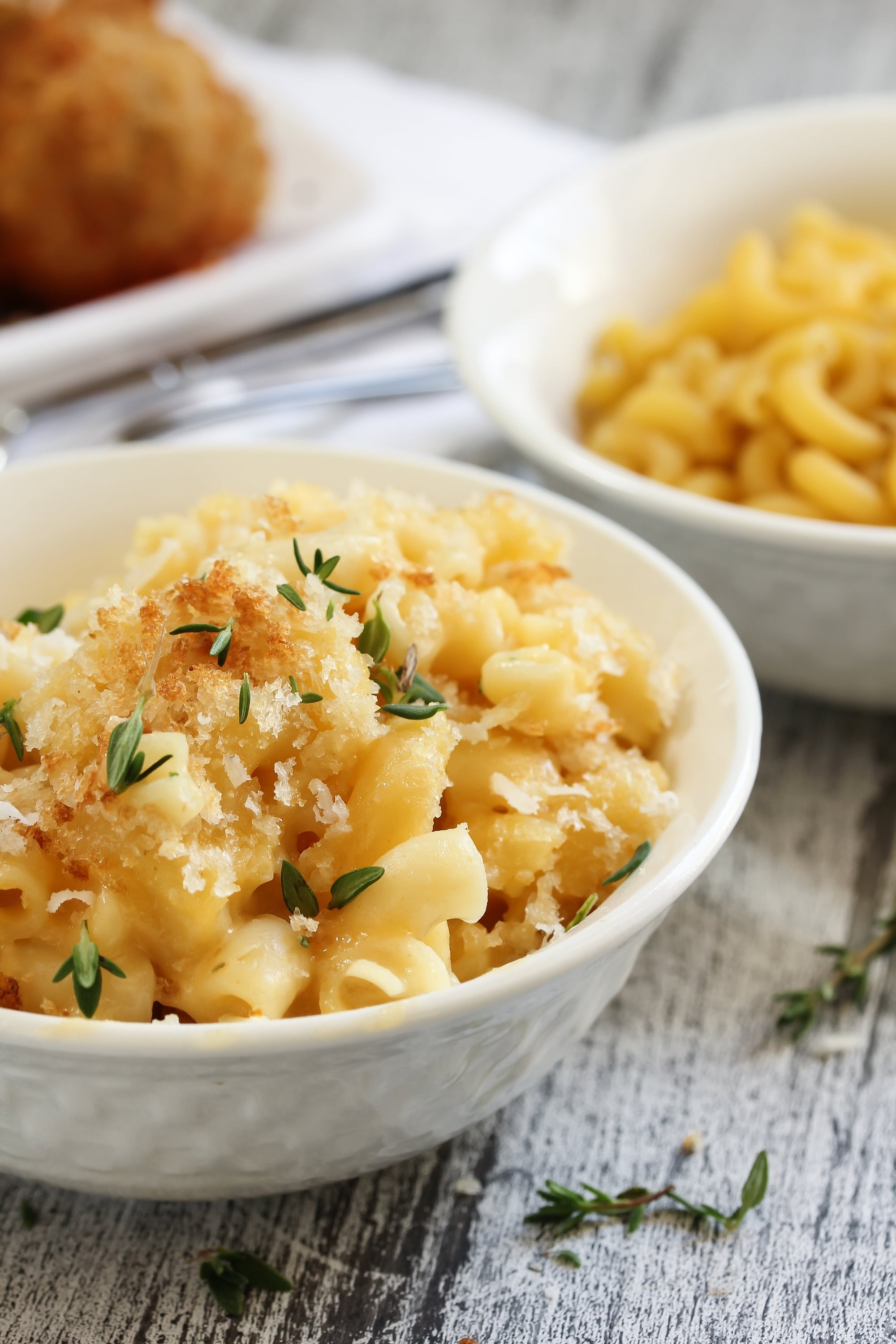 Homemade creamy baked mac and cheese doesn’t have to be complicated with layers of ingredients to be the soul-warming food you crave. This homemade baked macaroni and cheese is my most favorite and has pleased crowds, small families, kids and picky eaters alike–give it a try and you’ll see why. #comfortfood #kidfriendly #casserole #pastarecipe #macandcheese #dinnerinspiration