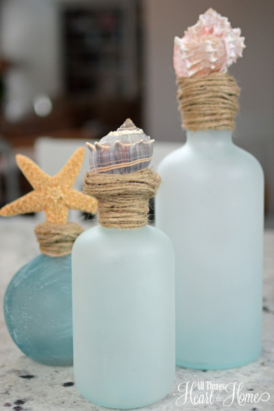 Finished with polyester binding, and backed with natural latex. Shell Topped Bottles - Sand and Sisal
