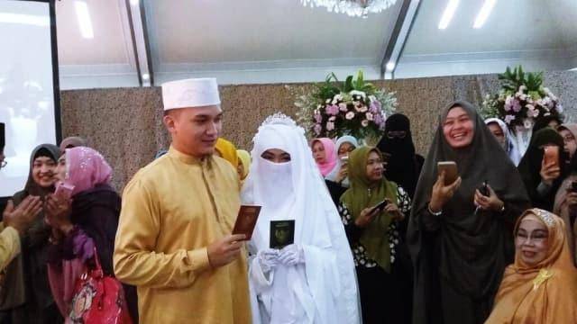 Inilah Sosok Kamilia Yasmin Wanita Bercadar  yang Dinikahi 
