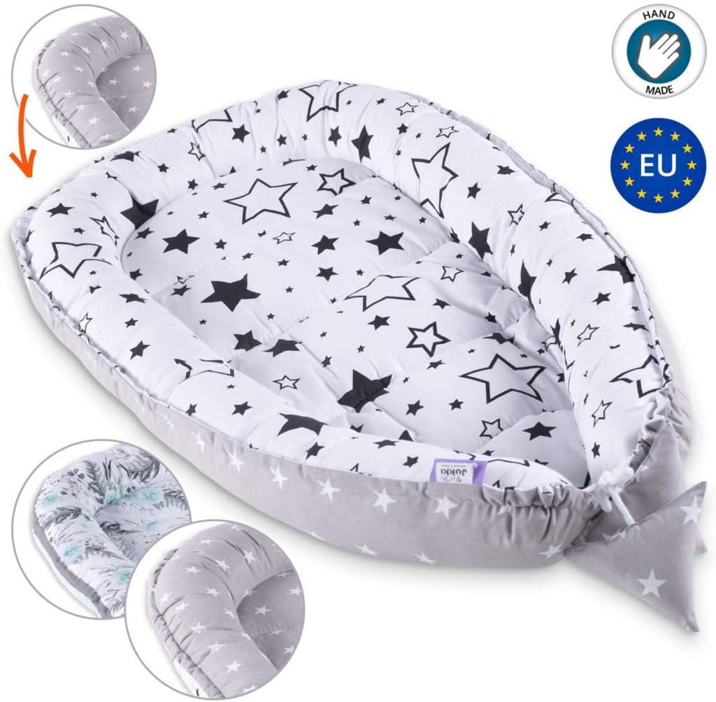 Il se place dans le lit à barreaux, . RÃ©ducteur de lit pour bÃ©bÃ© - SommeilBÃ©bÃ©.fr