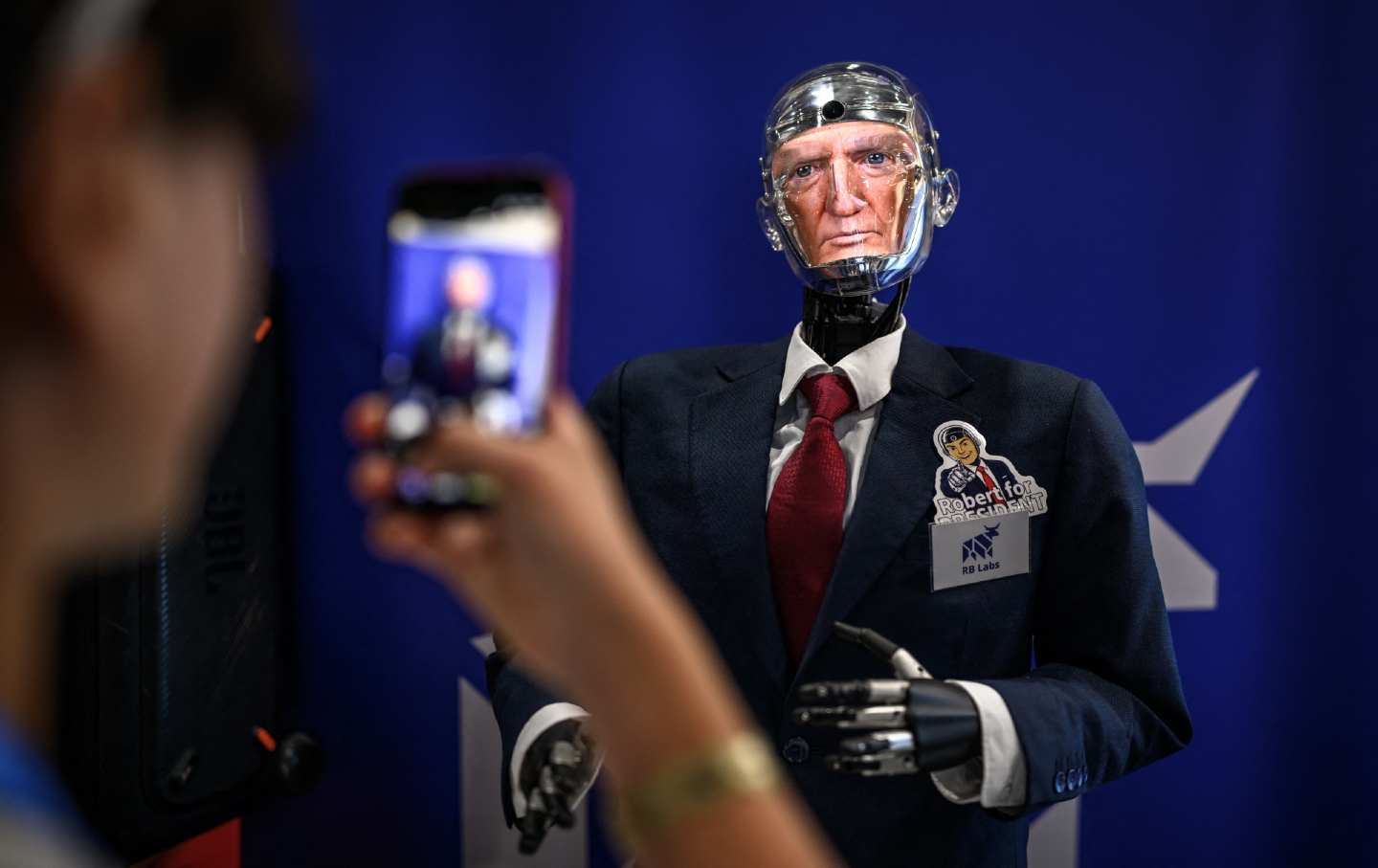 The face of President Donald Trump appears on Robert the Robot, an advanced conversational humanoid showcased at the UN's AI for Good Global Summit in Geneva in July.