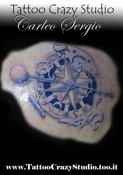 Bussola Con Ingranaggi - Tuttotattoo.com 566_x_400_jpg