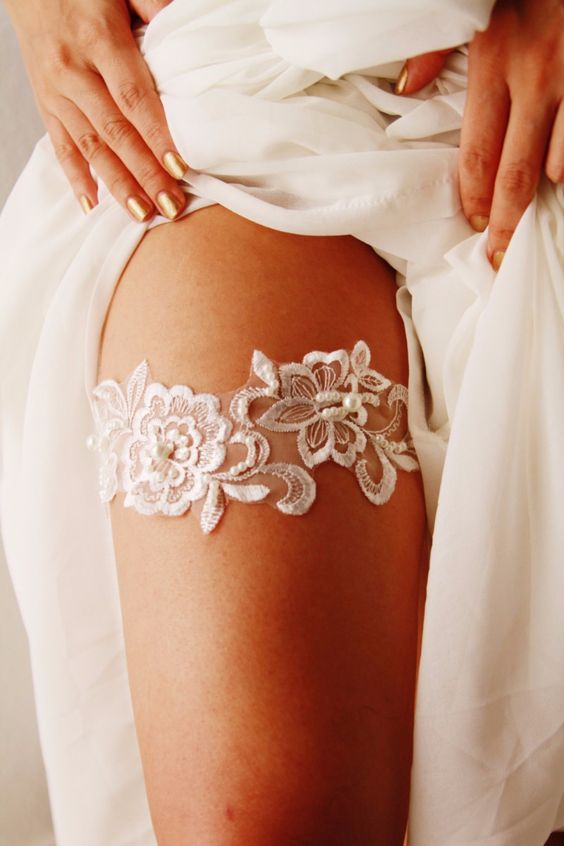 Have you ever want to make your own utility belt like superheros from comics? 20 Fabulous Lace Wedding Garter Ideas That You Cannot Say No!