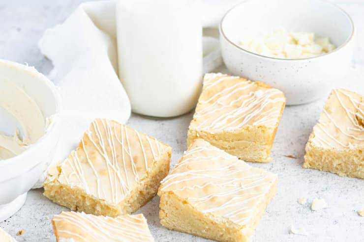 White chocolate brownies on a tray.