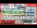 Protesters suspend themselves from Tower Bridge