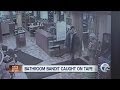 Bathroom bandit caught on tape