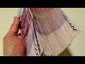 200k EUR in one hand. Counting 200,000 €