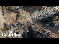 Drone footage shows widespread damage to two Israeli cities after Iranian missile strikes