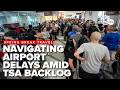 Travelers face long lines at airports, flight delays amid spring break travel