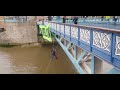 Extinction Rebellion Activist Abseils Off Tower Bridge