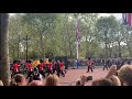 Crowds on The Mall in London watch Queen Elizabeth's final journey from Buckingham Palace