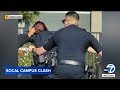 School police officers get caught up in fight in Highland, video shows