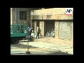 Early morning shots of damage, aid distributed, leaflets fall in sea