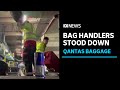 Baggage handlers filmed throwing Qantas luggage at airport stood down | ABC News