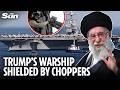 Moment Trump’s warships escorted by heavily armed US naval helicopters as Iran braces for US strikes